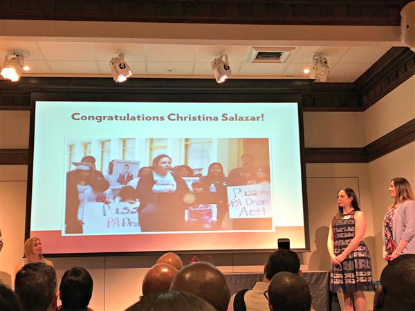 Christina Salazar accepts her award from the National Liberty Museum 